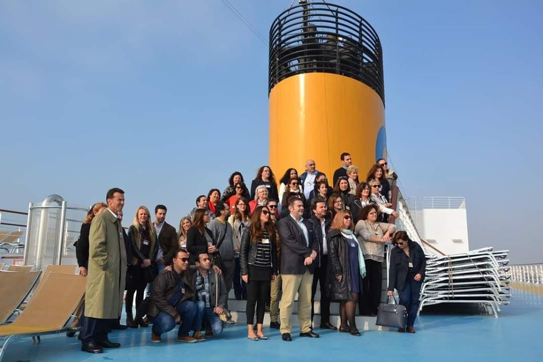 George Paliouras with colleagues on a cruise ship deck